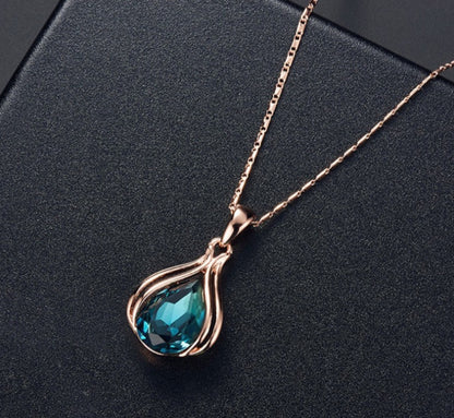 Peacock Blue Necklace and Earring Set with Rose Gold Accents